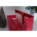 China Manufacturer Red Luxury Printed Gift Custom Shopping Paper Bag with Your Own Logo